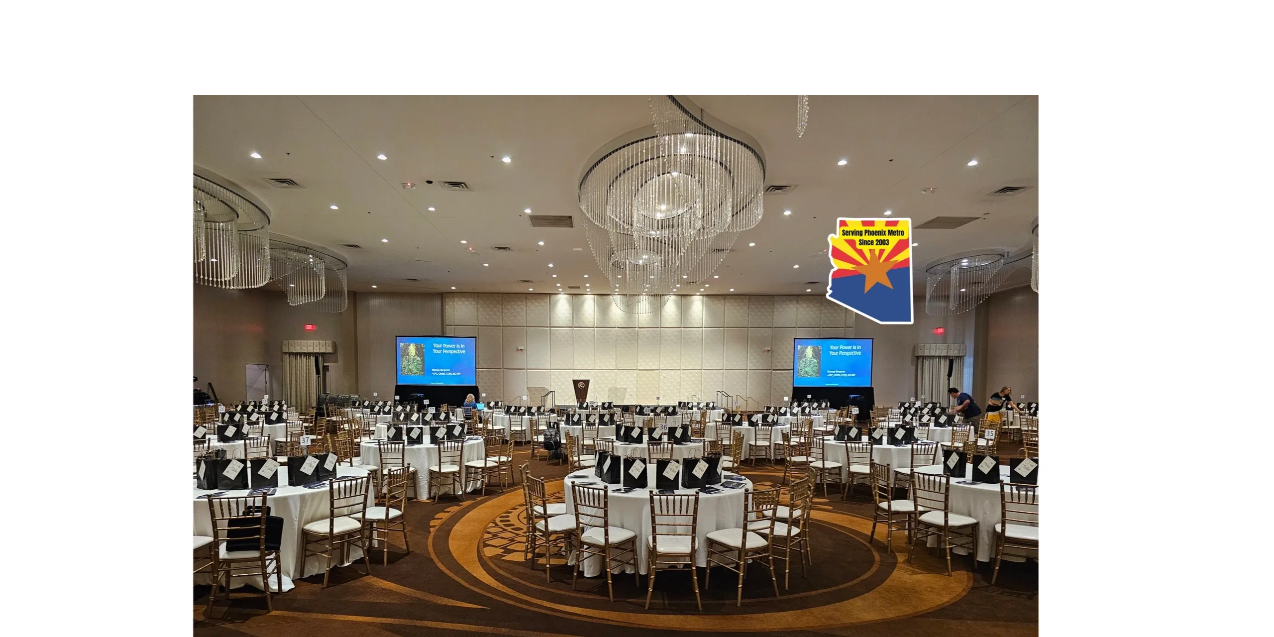 Corporate ballroom event with blue digital displays