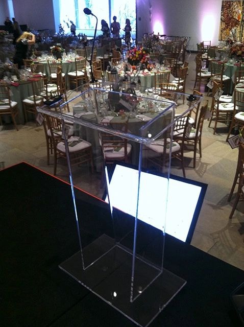 Lucite clear acrylic podium on stage